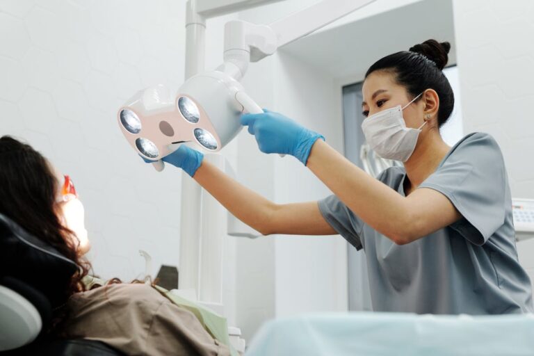 A Woman Wearing a Face Mask and Blue Gloves