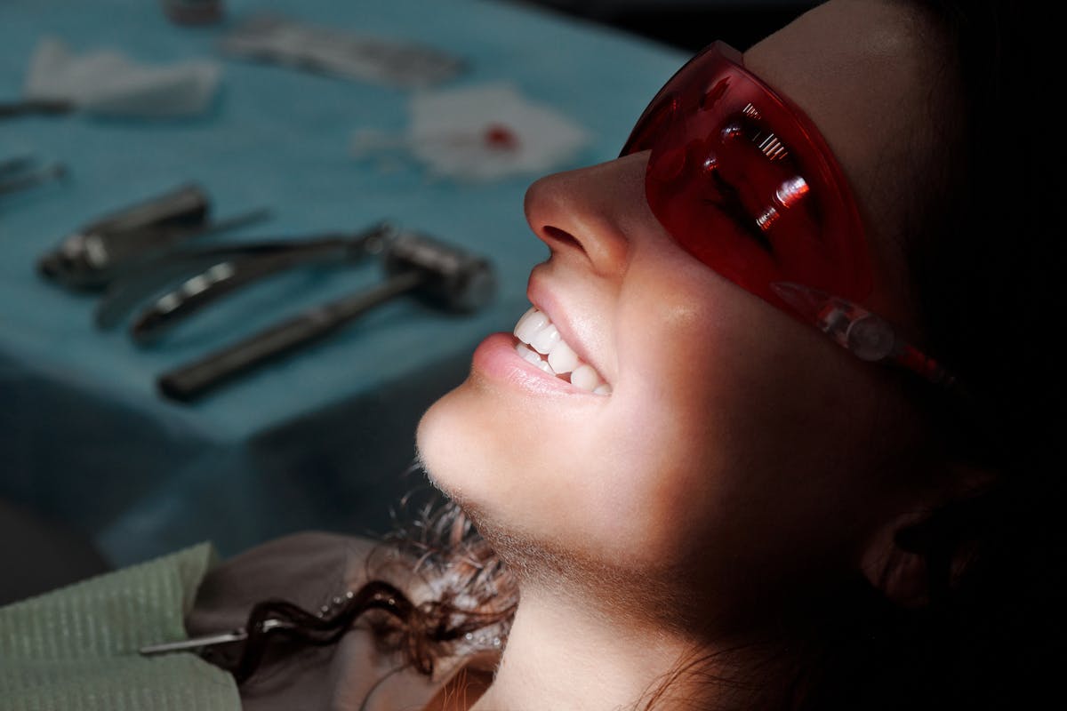 A Woman in Red Glasses