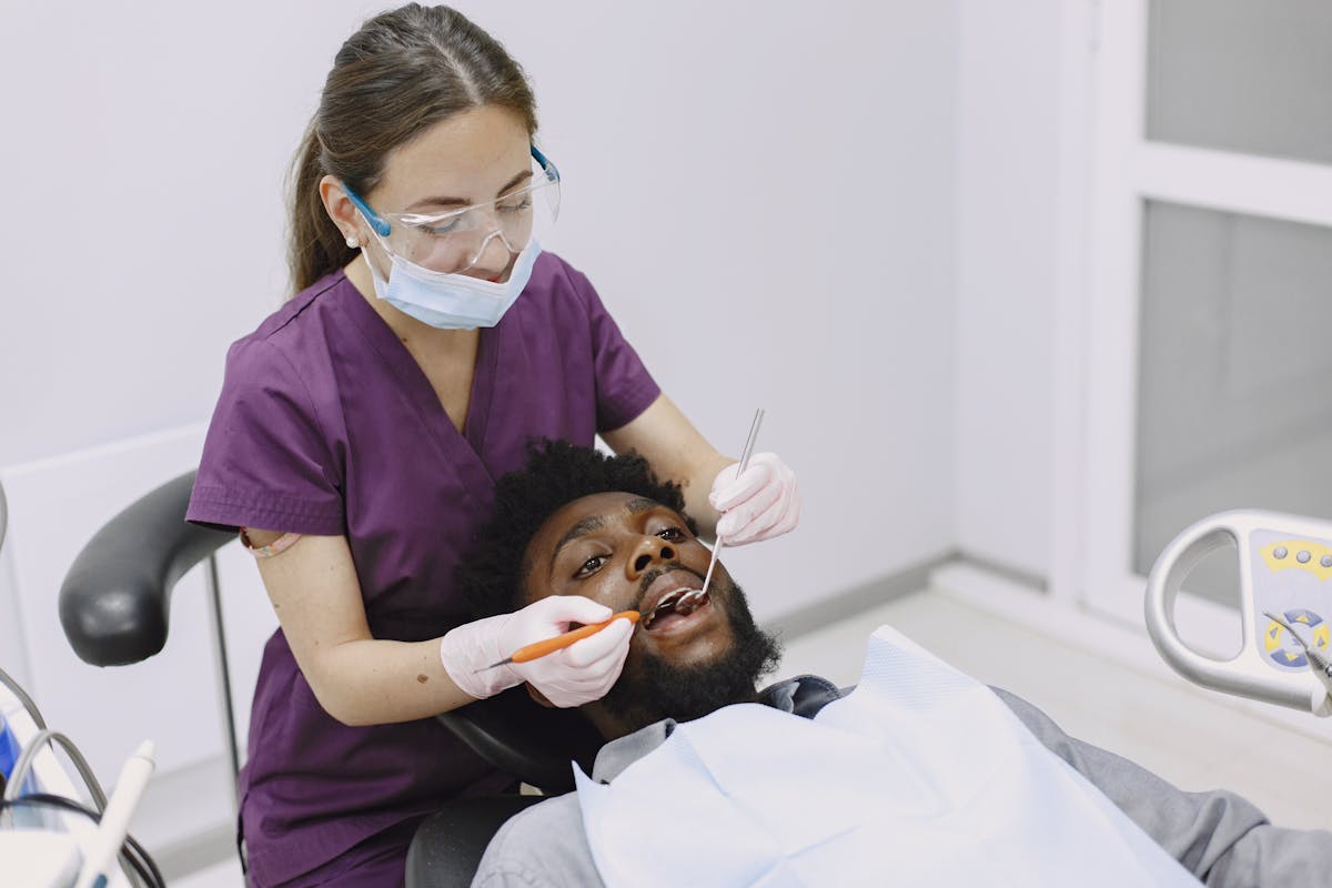 Man Having Dental Checkup
