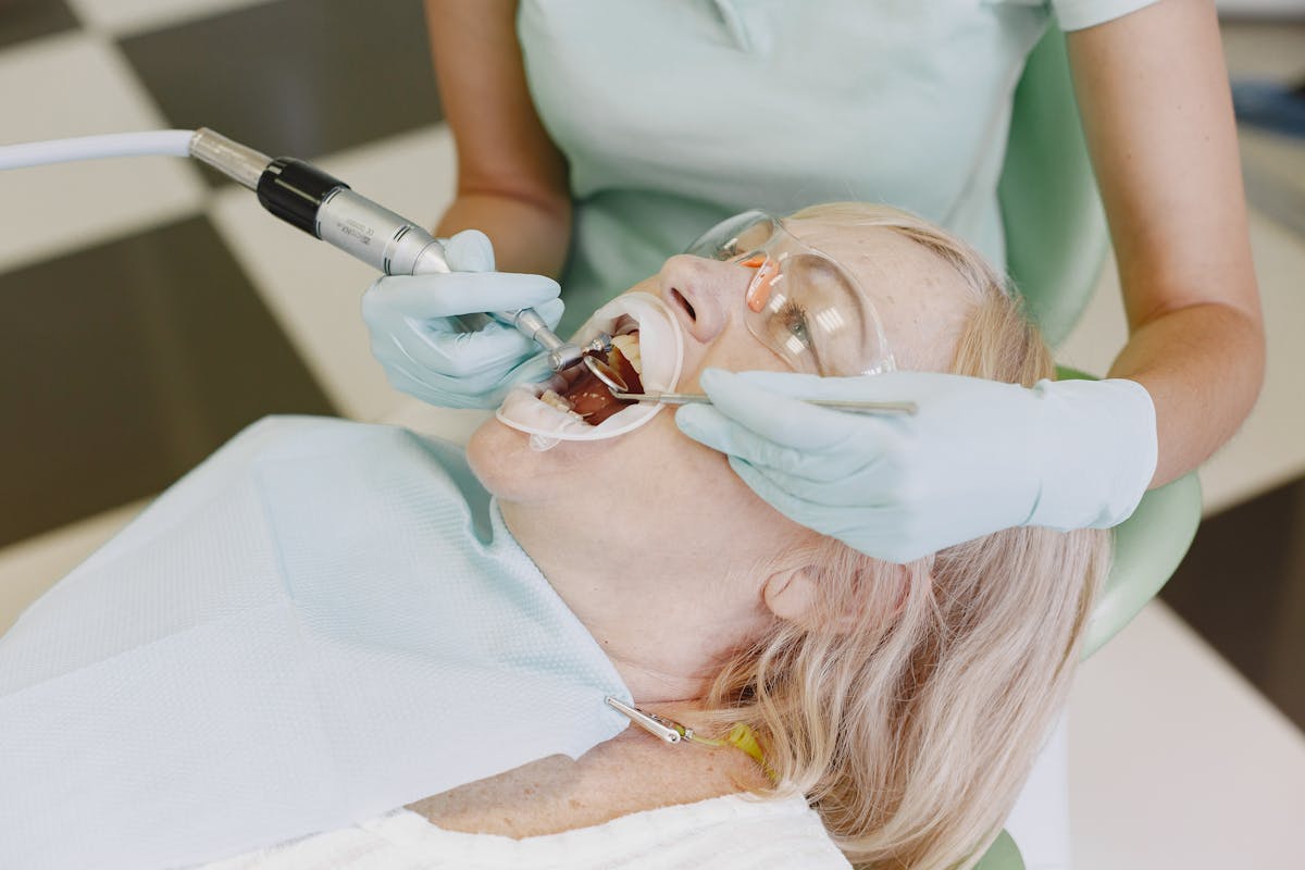 Woman Getting Dental Treatment